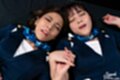 Flight attendants on their back hands clasped faces glazed with bukkake cum